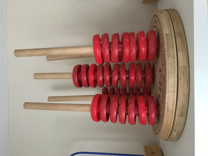 Wooden Dowel With Recycled Lids