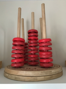 Wooden Dowel With Recycled Lids